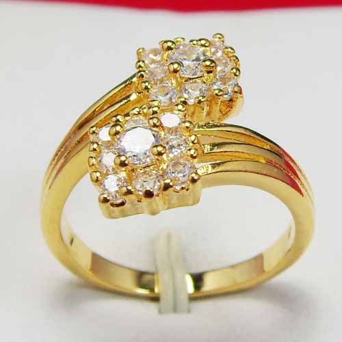 “Simplicity is the keynote of all true elegance.” Gold rings